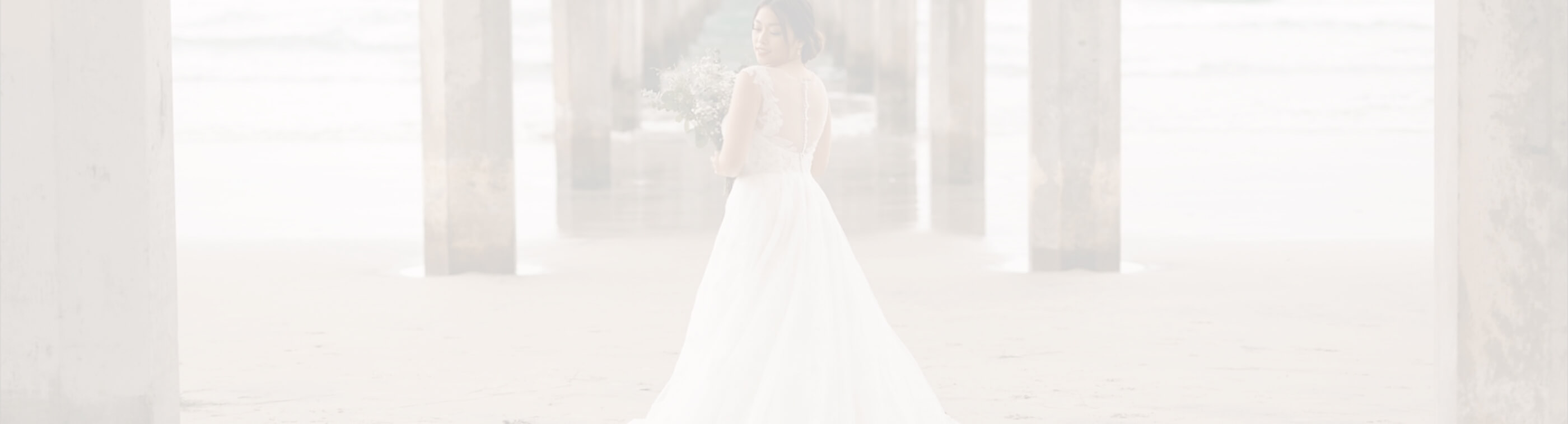 Model wearing a white gown